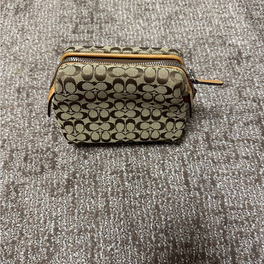Tan coach makeup bag